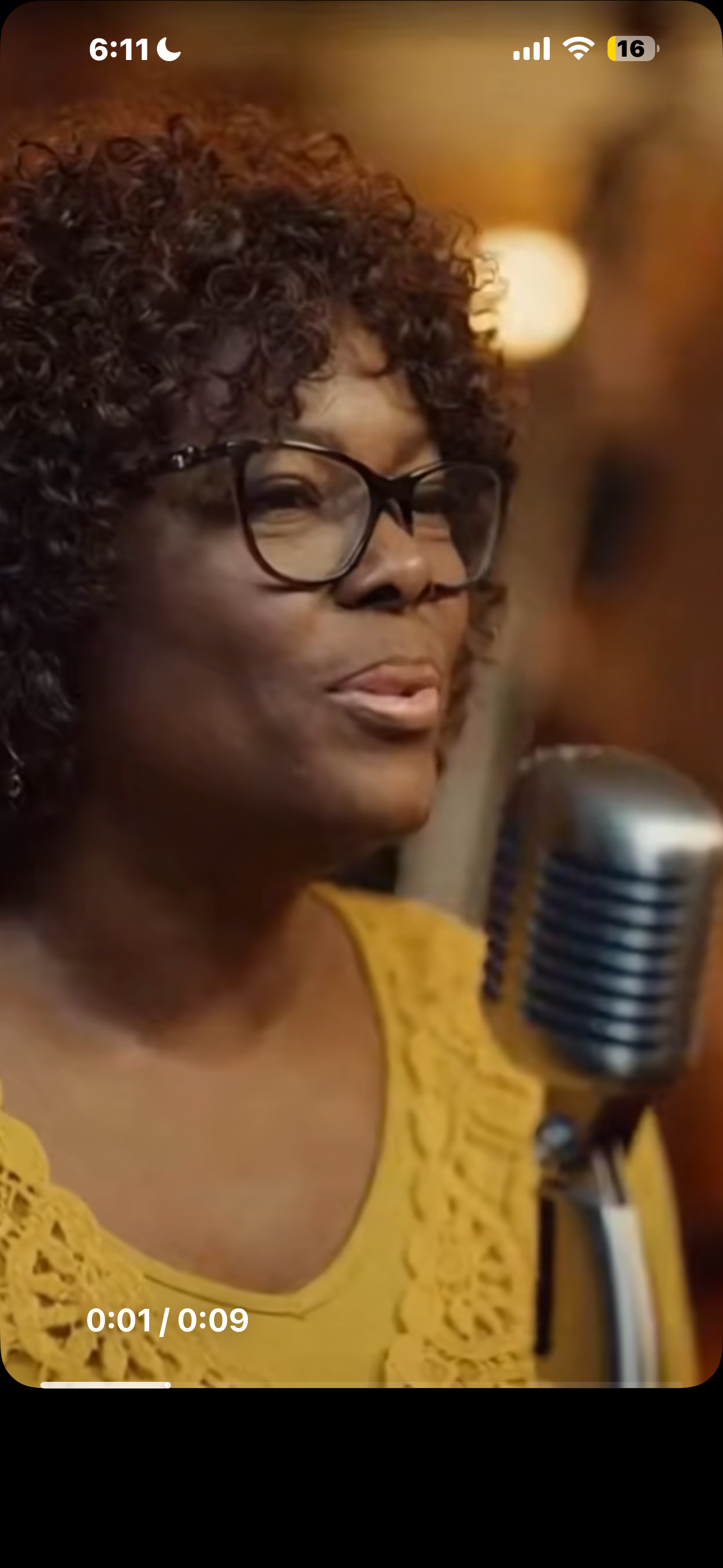 Diann Shumate, jazz vocalist in Phoenix, performing at a vintage microphone.